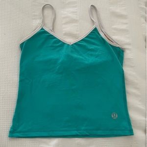 An assortment of Lululemon workout tops - Size 8